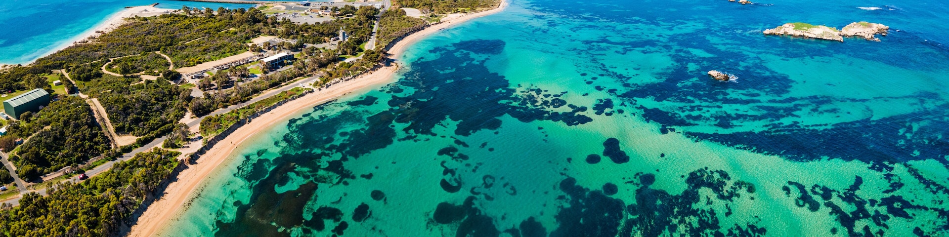 Aerial view of Point Peron and Shoalwater Bay with rocky limestone formations and seagrass.