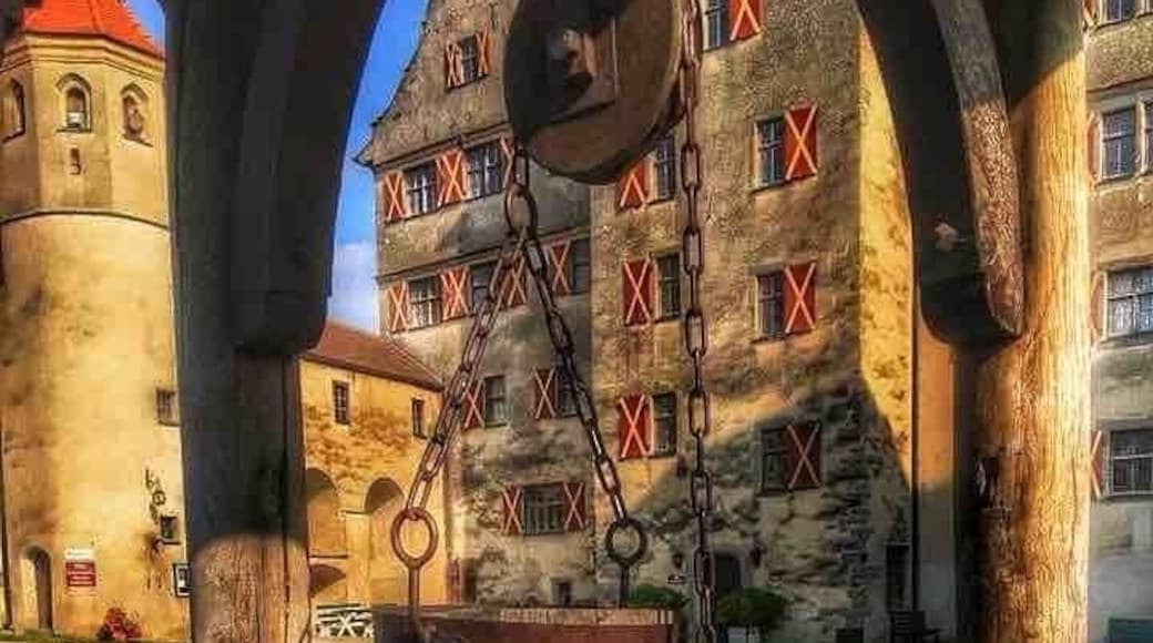 The Harburg Castle is one of the largest, best-preserved castles in all of Germany. Visiting Harburg and the Harburg Castle is like stepping back into the Middle Ages! Harburg Castle is one of the jewels of the Romantic Road. Wonderfully preserved, the castle sits high on a hill and overlooks the town for which it's named.
It is unclear when the first structure was erected, but the castle was first mentioned in a document in 1150. However, historians believe that portions of the castle may have been built in the 10th and 11th centuries, and Roman remains have been found on the site.
Because of its strategic location, it provided a military stronghold during the reign of the Staufer-Kings from 1079 to 1272. It was referenced in documents in 12th century as the Staufer Imperial Castle. In 1295, the castle was transferred to the Count of Oettingen and it has been in the Oettingen, and later the Oettingen-Wallerstein, families ever since.
The castle complex, including the castle house, chapel, sentry walk (complete with holes through which to pour hot oil on invading marauders!), prison tower, dungeon, and various buildings used to support the inhabitants, is surrounded by a wall supporting six towers. In the center of the complex is a large courtyard with a well.