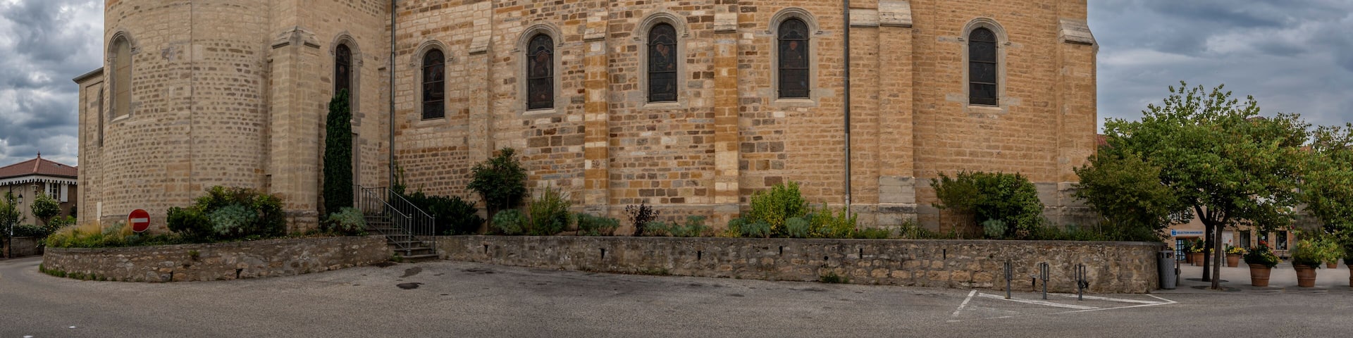 Dardilly, France - 08 06 2023: Panoramic view outside Saint Jean-Marie Vianney Church facade.