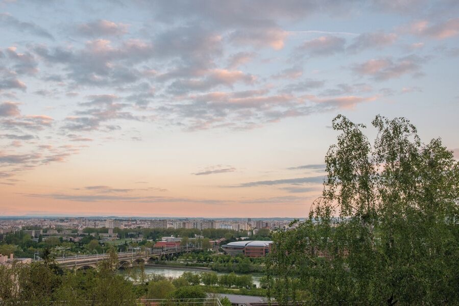 Sunset overlooking the bridges of the Rhone and the conference buildings
