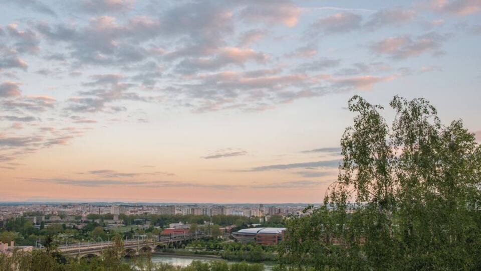 Sunset overlooking the bridges of the Rhone and the conference buildings