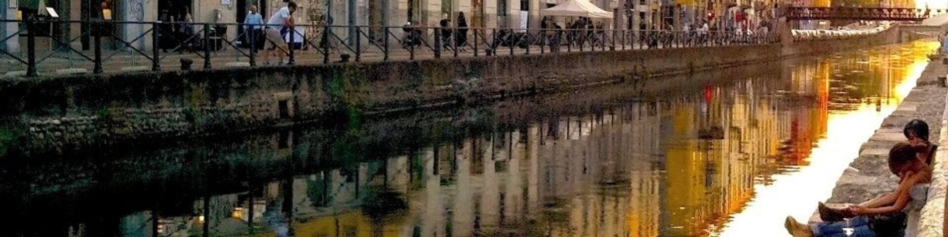 #TroveOn A charming district where you can stroll pleasantly enjoying the breezy atmosphere while window shopping to a surround of boutique design shops, art galleries or have a drink with plenty of bars, cafe to choose from. When I took this shot, of the Navigli, It is being transformed into a fashion runway, for an event by local Italian Designers. I quickly took this shot while everything is still Serene. The water is clear by the way, not sure if its clean. #reflections