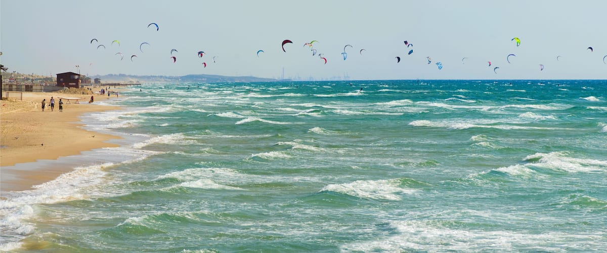 Lots of kites above sea, Bat-Yam beach, Israel