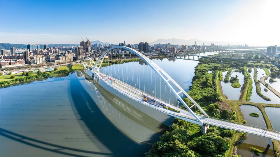Crescent Bridge - landmark of New Taipei, Taiwan with beautiful illumination at day, aerial photography in New Taipei, Taiwan.