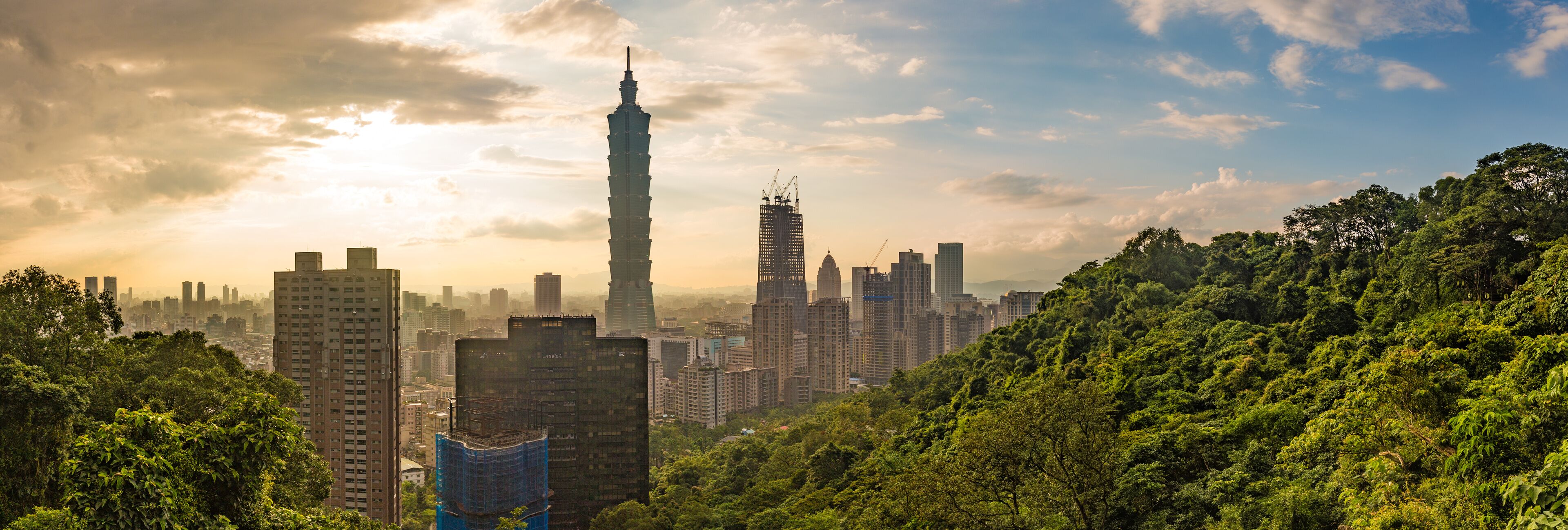 ​
Cityscape nightlife view of Taipei. Taiwan city skyline at twilight time,  The seaside mountain town scenery in Jiufen, with Taipei 101 Tower in Xinyi Commercial District 