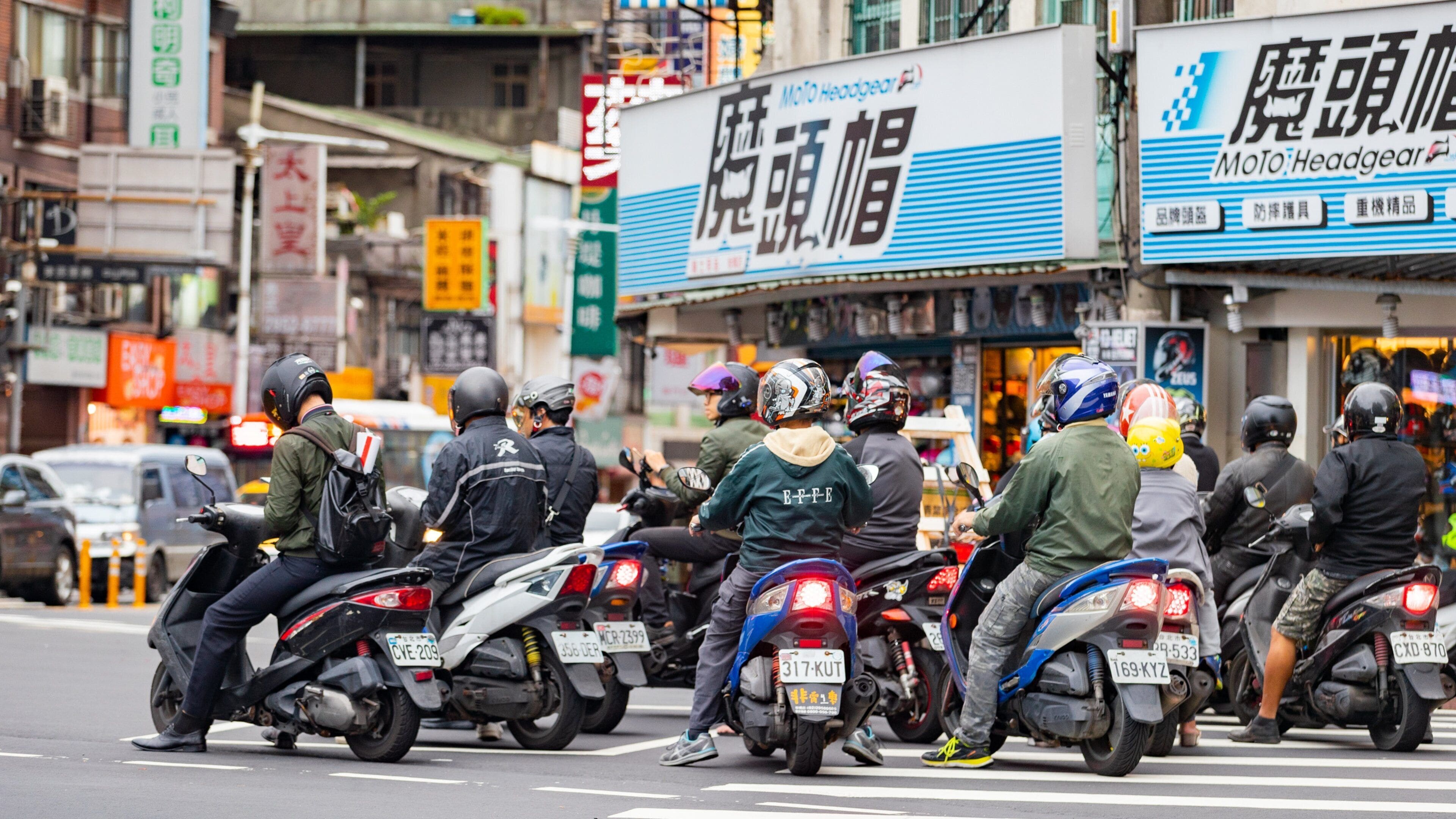Banqiao featuring motorbike riding, a city and street scenes