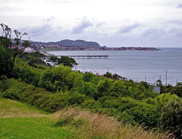 Colwyn Bay From Eirias Park Showing the pier, with Rhos on Sea behind and the Great and Little Ormes in the far distance