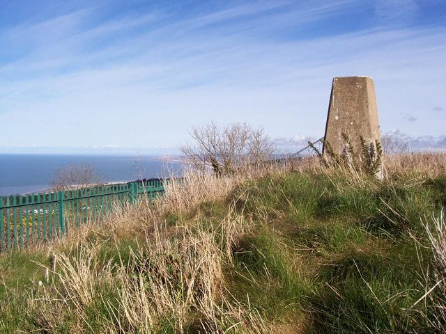 Mynydd Marian trig point Sitting in a little fenced enclosure atop the local nature reserve. The elevation is 208m, testifying to the very steep coastal hills.