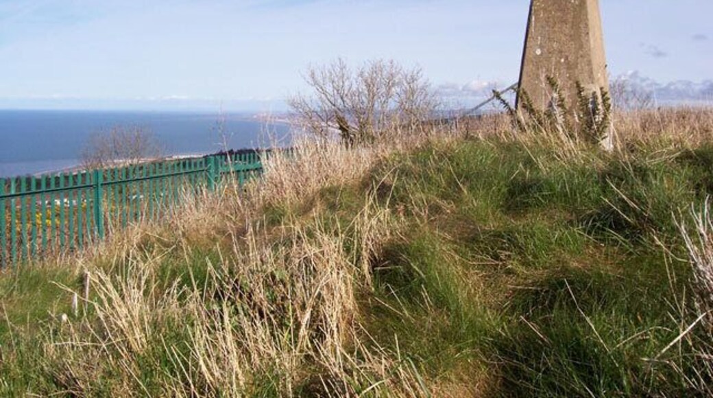 Mynydd Marian trig point Sitting in a little fenced enclosure atop the local nature reserve. The elevation is 208m, testifying to the very steep coastal hills.