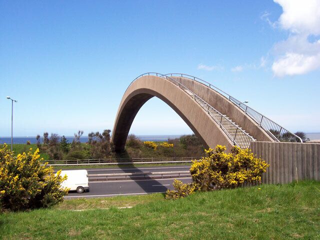 The Rainbow Bridge The innovative design of this single-span elliptical arch is apparent in this seaward view. It is horrid to cross, however, as the steps vary in height and slope as the arch is crossed.
