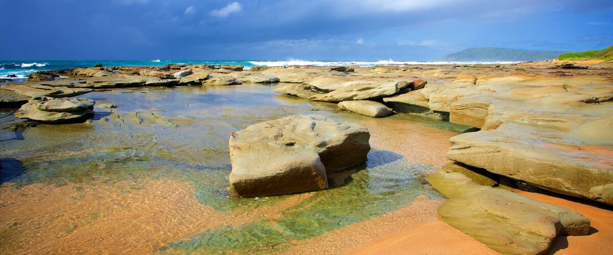 Toowoon Bay featuring a bay or harbor and rocky coastline