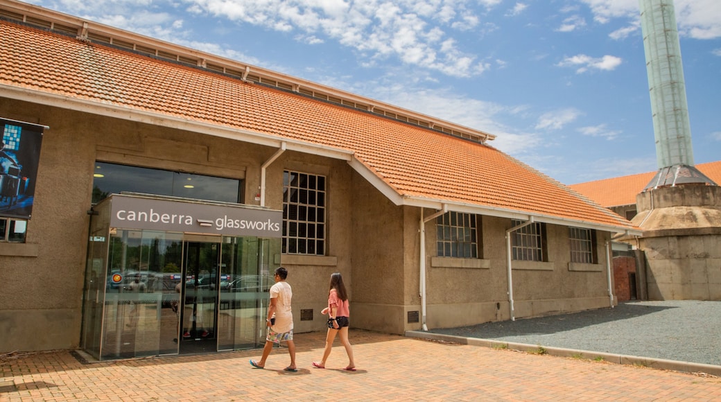 Kingston which includes street scenes and signage as well as a couple