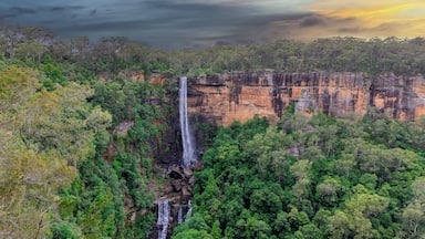 Beautiful flowing River in Fitzroy water Falls in Bowral NSW Australia beautiful colourful cloudy skies lovely waterfalls