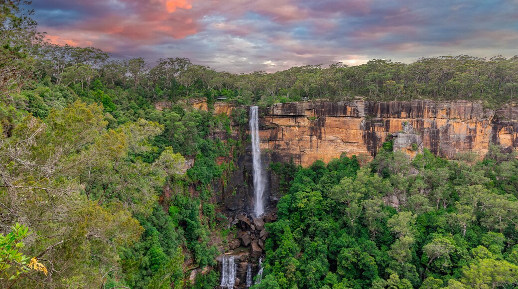 Beautiful flowing River in Fitzroy water Falls in Bowral NSW Australia beautiful colourful cloudy skies lovely waterfalls