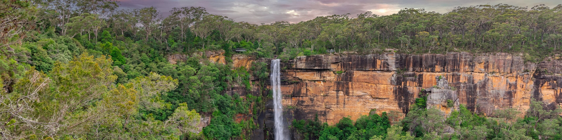 Beautiful flowing River in Fitzroy water Falls in Bowral NSW Australia beautiful colourful cloudy skies lovely waterfalls