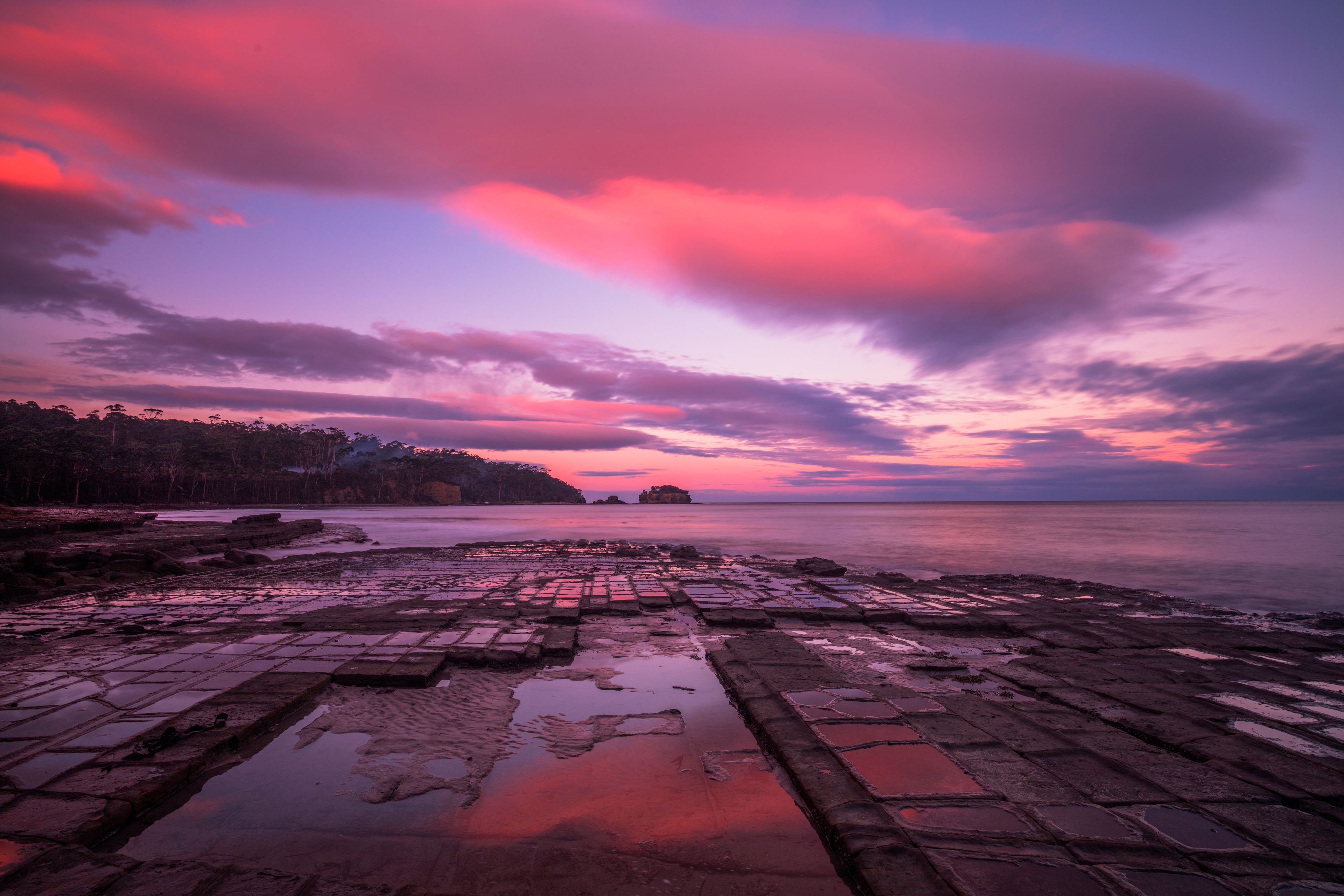 Beautiful sunset over the Tessellated Pavement . A rare geological phenomena . At Eaglehawk  Neck, South Eastern Tasmania, Australia.
