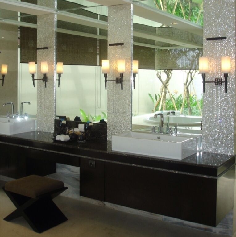 Master Bathroom with full height glass partition around Bathtub