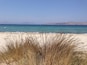 Sand , crystal blue water , sand dunes and salt lake nearby the beach . Tigaki, kos , Greece