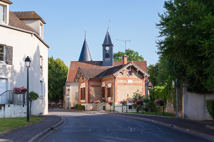 landmark buildings along rue saint denis in commune or town of gressy france