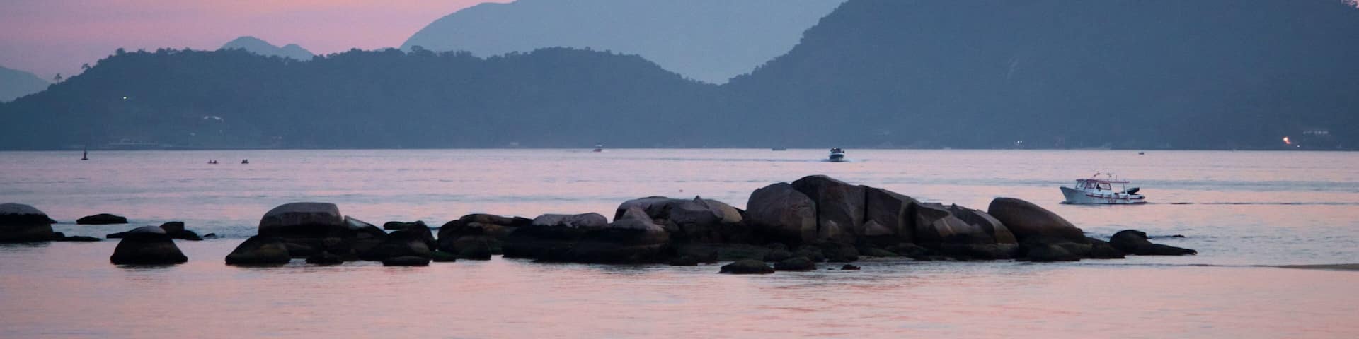Angra dos Reis which includes a bay or harbor and a sunset