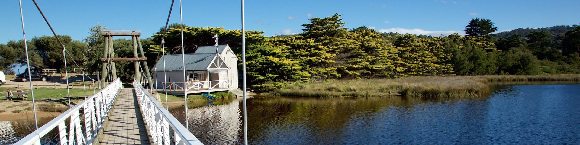 Lorne which includes a river or creek and a bridge