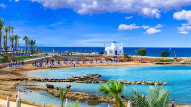 Panoramic View of Agios Nikolaos White Chapel and Louma Beach with turquoise sea in Protaras, Cyprus