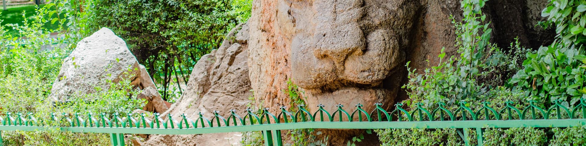 Ifrane Lion sculpture carved on the rock a popular landmark in the middle of greenery