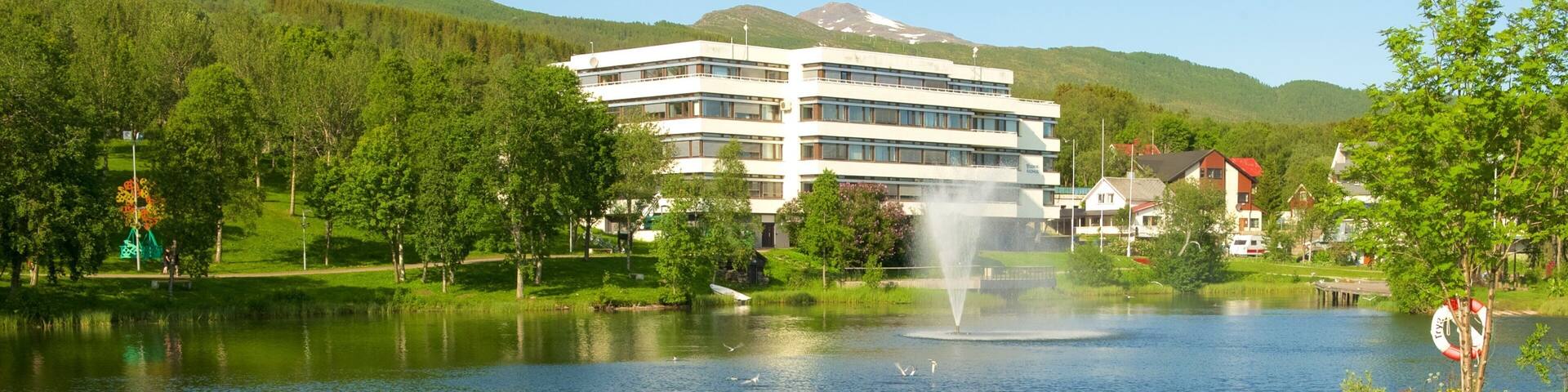 Finnsnes featuring a fountain, a lake or waterhole and a luxury hotel or resort