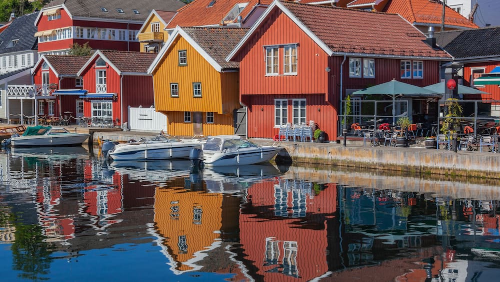 A harbor with colorful houses and boats.