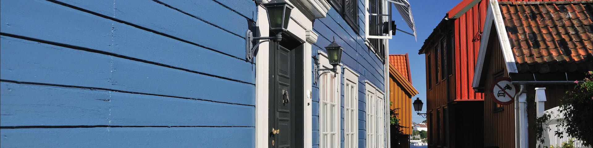 Blue timberhouses in Larvik, Norway, summer time