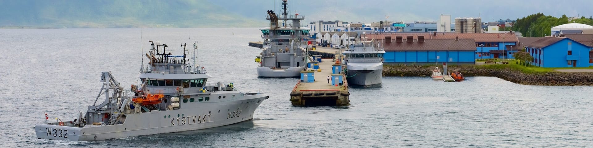 Sortland showing a lake or waterhole, mist or fog and boating