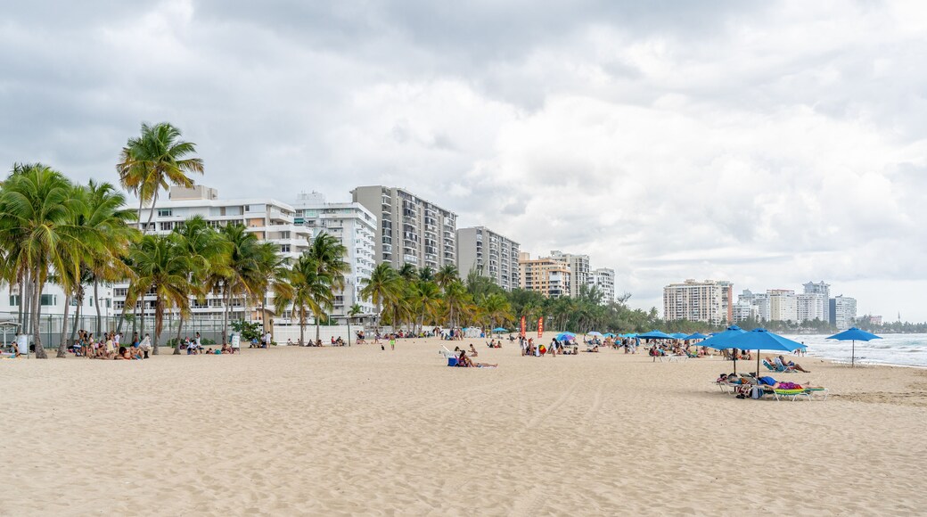 Isla Verde, Puerto Rico - March 29, 2019: Beach-goers Enjoying the Beautiful Beaches of Isla Verde, Puerto Rico.