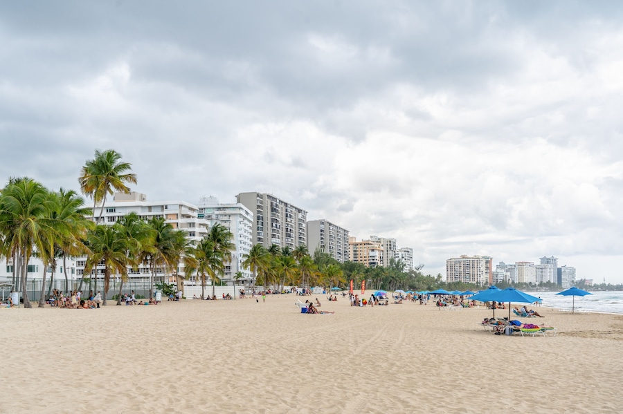 Isla Verde, Puerto Rico - March 29, 2019: Beach-goers Enjoying the Beautiful Beaches of Isla Verde, Puerto Rico.