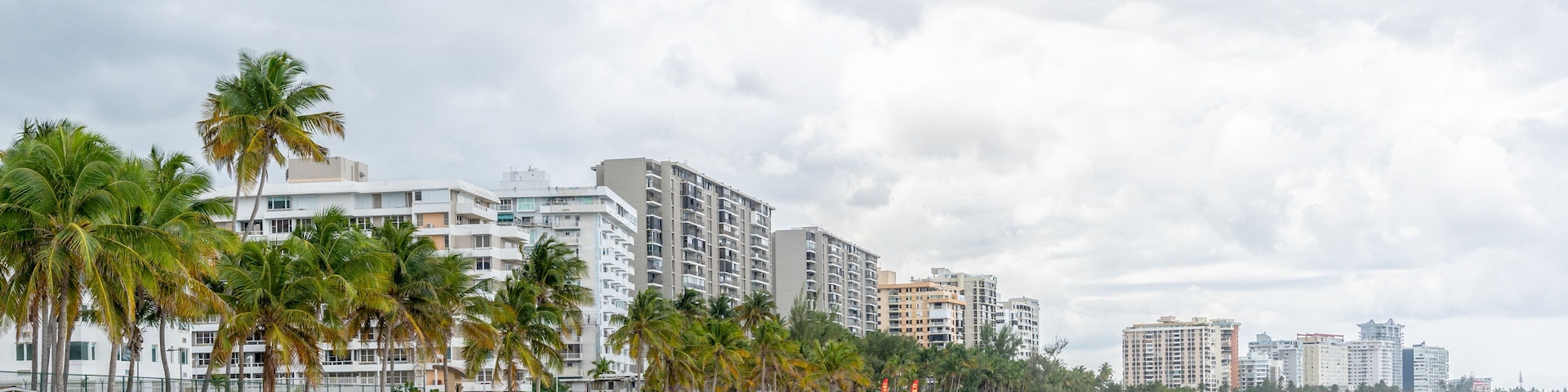 Isla Verde, Puerto Rico - March 29, 2019: Beach-goers Enjoying the Beautiful Beaches of Isla Verde, Puerto Rico.
