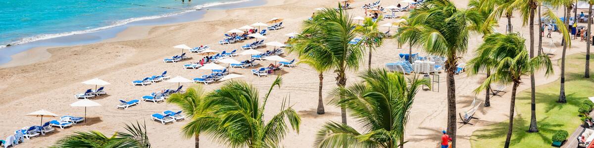 Puerto Rico beach travel vacation landscape background. Isla Verde resort in San Juan, famous tourist cruise ship destination in the Caribbean.