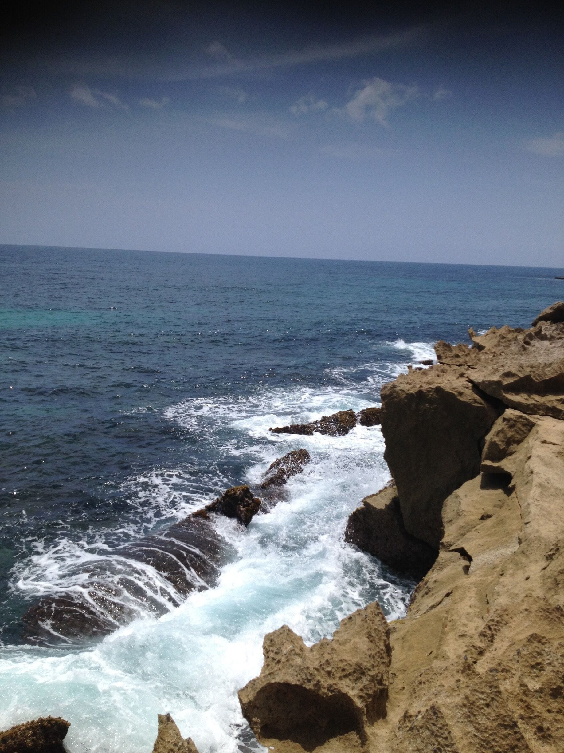 You can climb up to the rocks off a running path to see this.