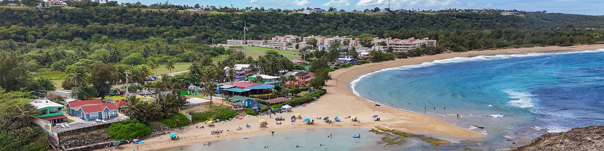 Family friendly natural protected pool at Montones Beach in Isabela on the northwest side of the island of Puerto Rico in the Caribbean.