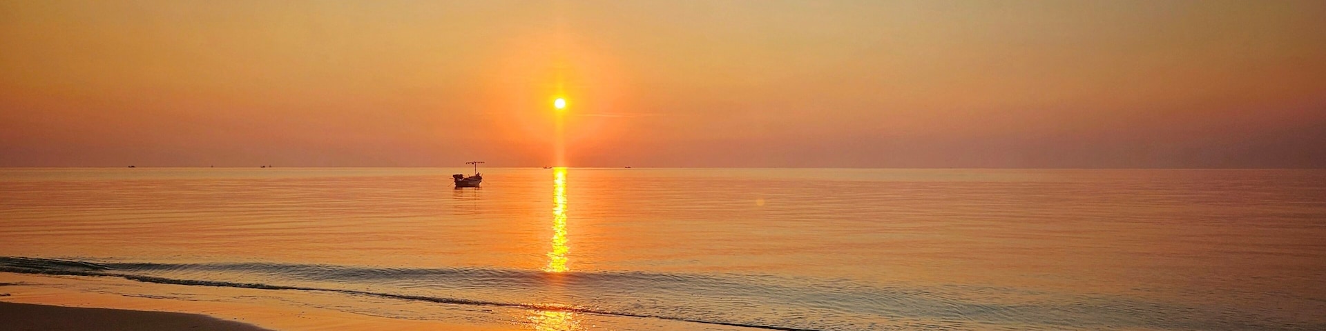 Serene Morning Dawn with Local Fisherman Boat in the romantic atmosphere ocean.