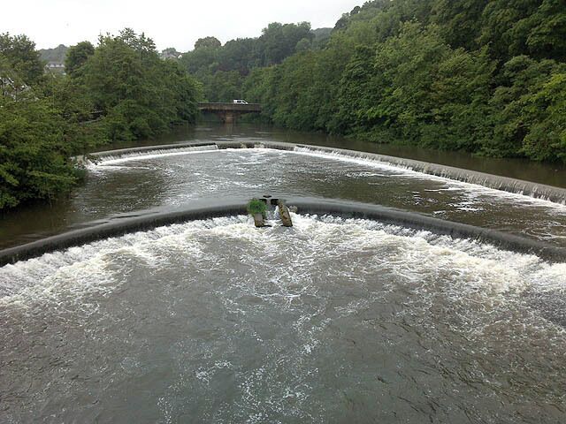 Weirs at Milford A pair of beautiful horseshoe weirs just downstream of Milford Bridge, which can be seen, complete with white van.