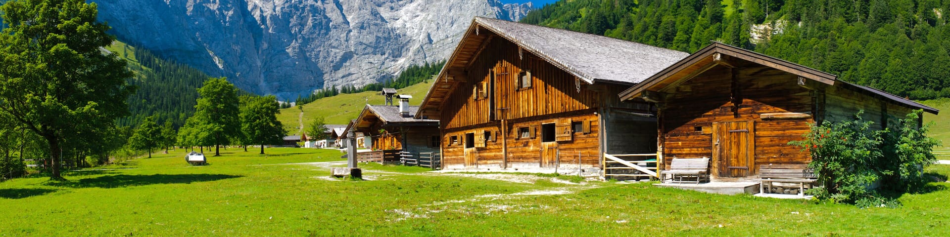 panorama landscape in bavaria with wooden old farmhouse