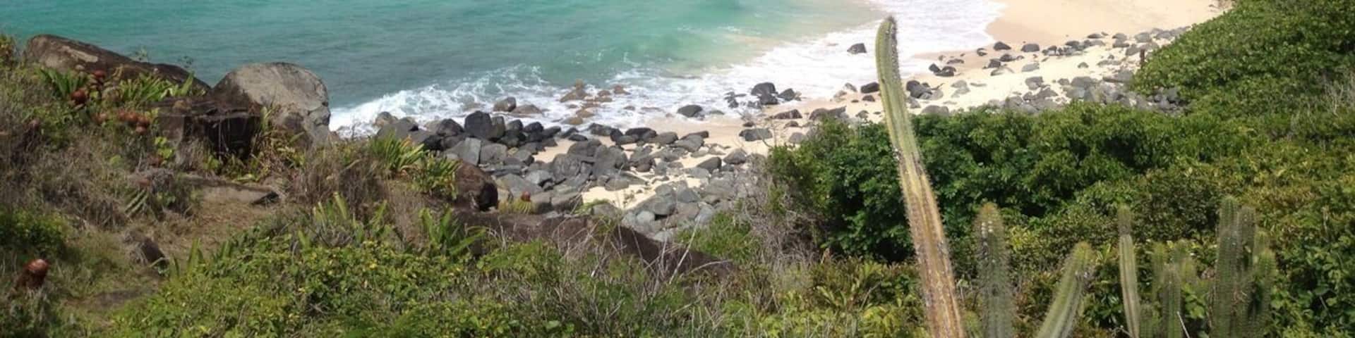 The 45 minute hike to this secluded beach is so worth it. Park at top of hill near Anse Marcel and follow signs. The trail is filled with hermit crabs, cactus, and great views. Shoes needed (flip flops are a no go). Bring water and lunch.