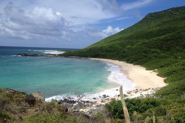 The 45 minute hike to this secluded beach is so worth it. Park at top of hill near Anse Marcel and follow signs. The trail is filled with hermit crabs, cactus, and great views. Shoes needed (flip flops are a no go). Bring water and lunch.