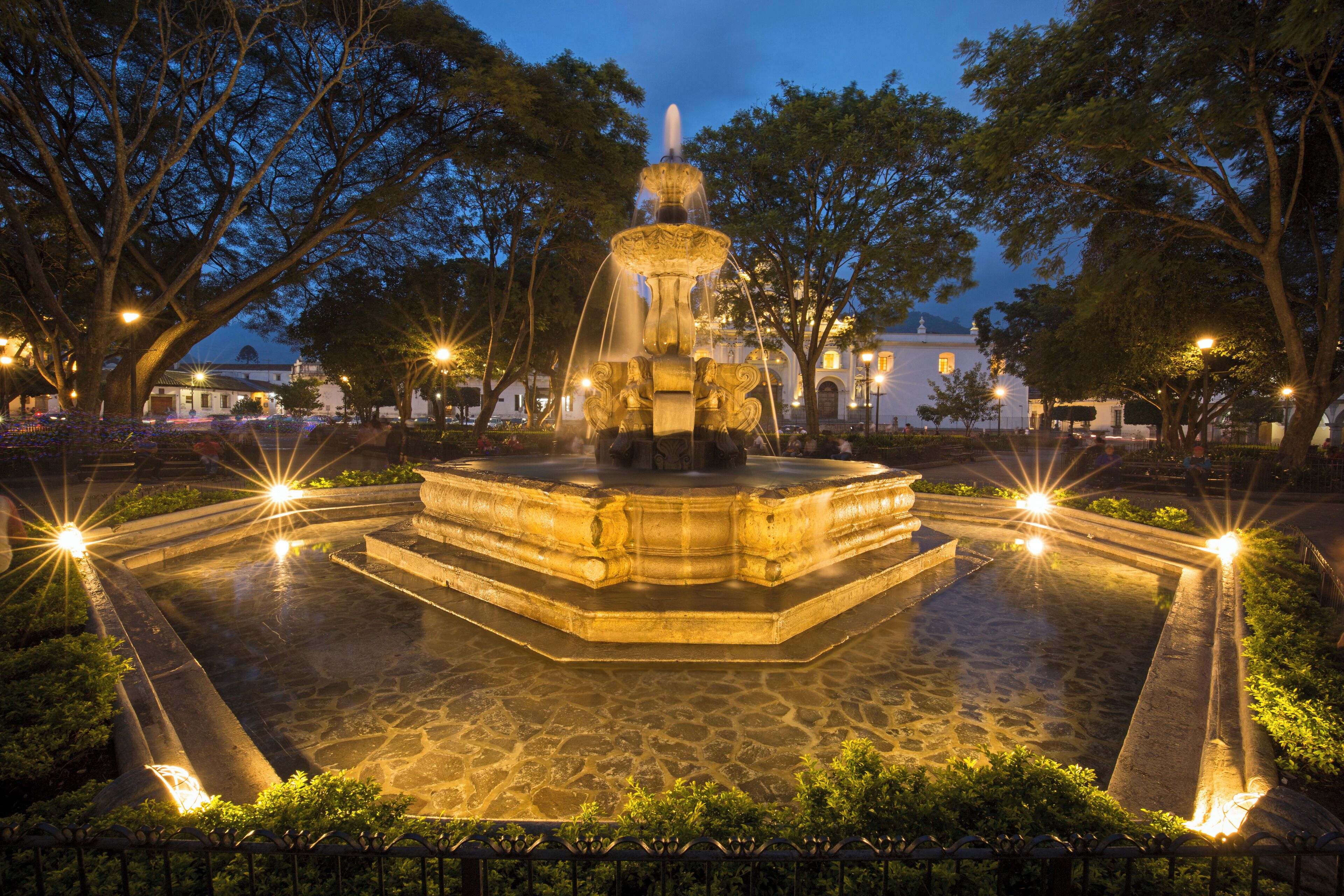 Blue hour at the fountain in the central square in Guatemala's Antigua. Facing the Cathedral.