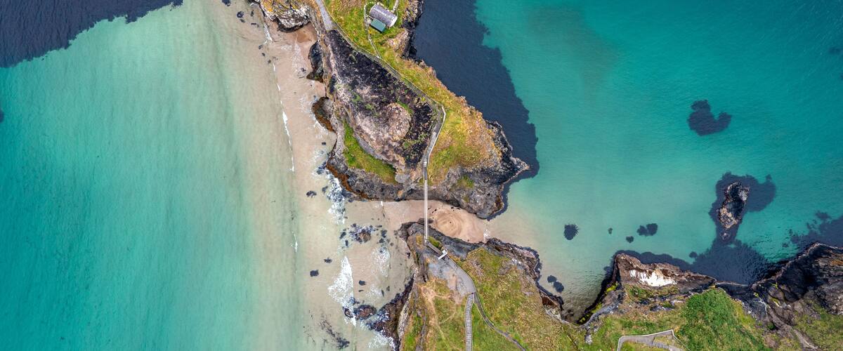 Aerial View over beautiful clear water in Antrim, Northern Ireland