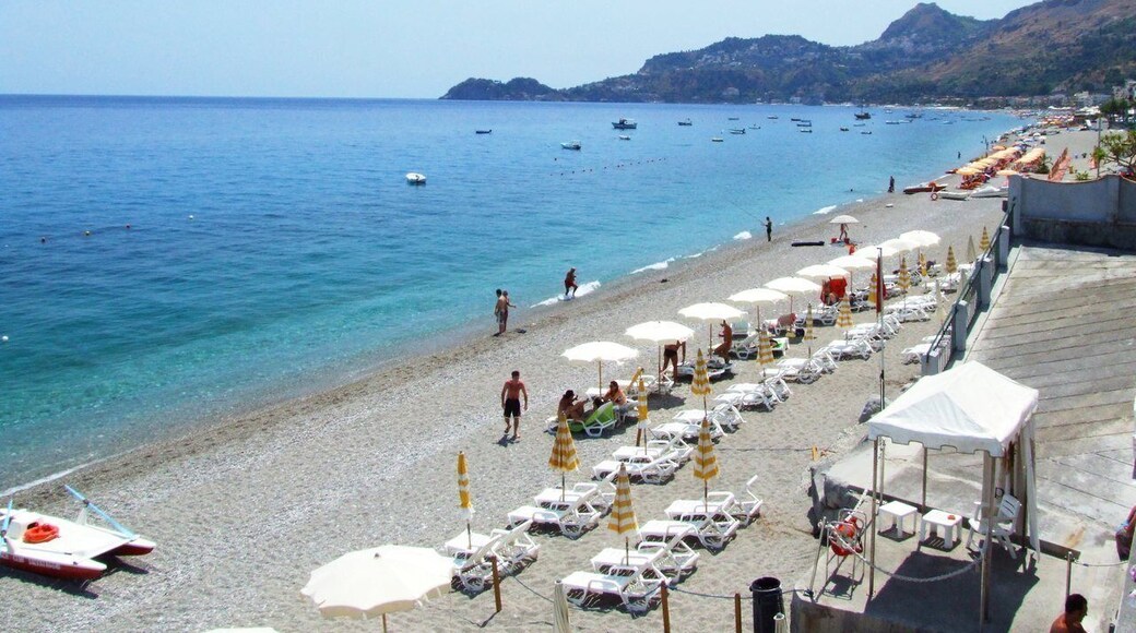 taormina giardini naxos letojanni isola bella club med clubmed sea beach flowers iris sicilia sicily italia italy landscape wallpaper castielli travel creative commons zero cc0 cc gnuckx facebook bebo news notizie panoramio flickr googleearth high qualiy photo gallery picture pic pics maps googlemaps geotagged geotag gps localized locale wiki wikipedia