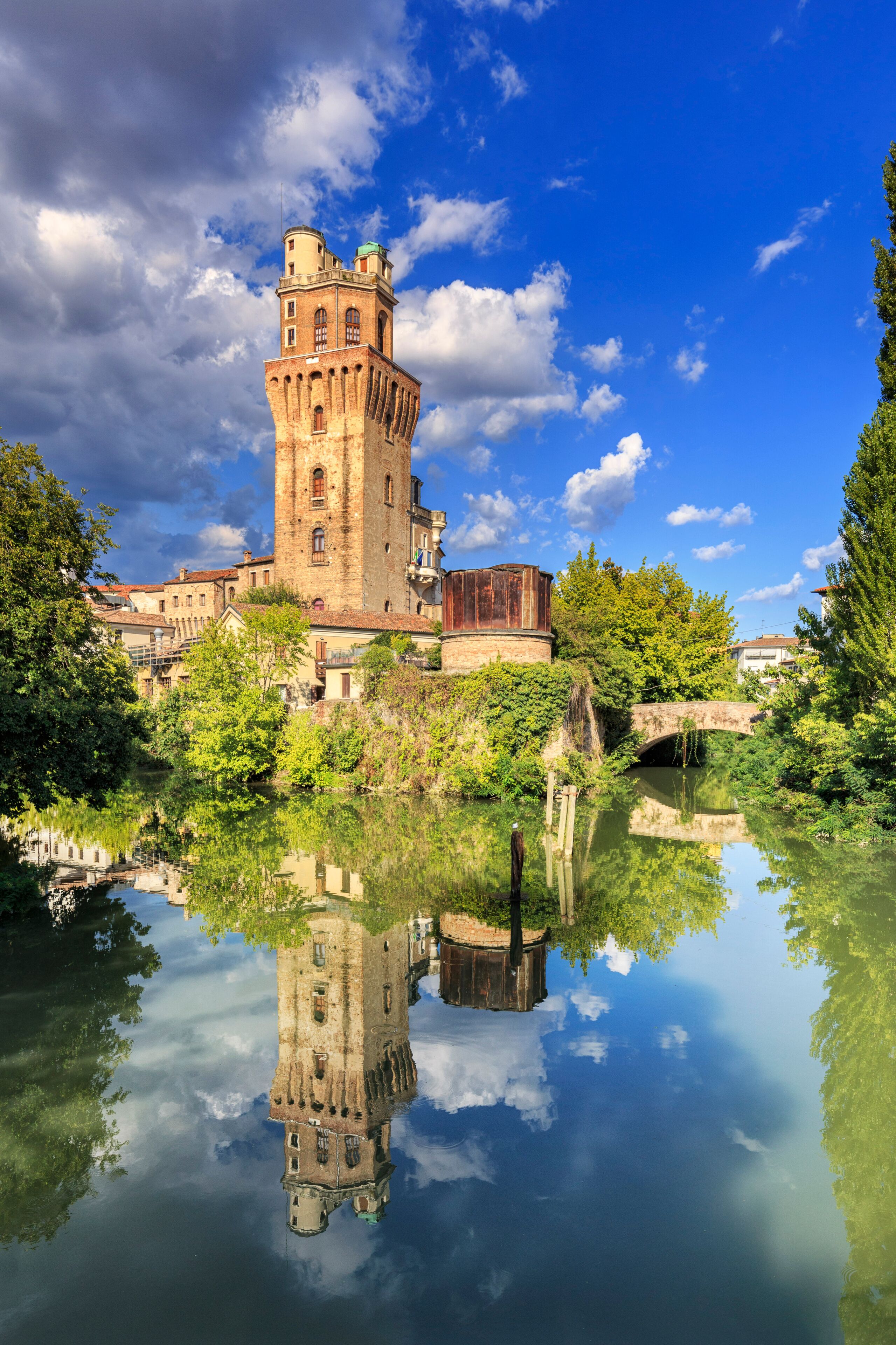 Italy, Italia. Veneto. Padova district. Padua, Padova. La Specola (old astronomic observatory) and the Bacchiglione river.