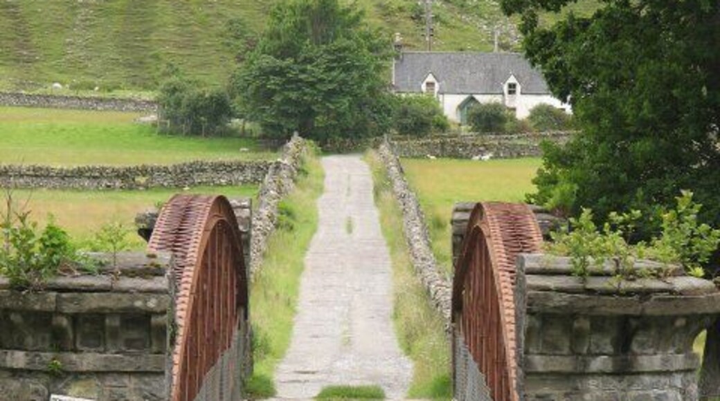 Auchindrean Bridge Track leading to Auchindrean over a bridge designed by Sir John Fowler.