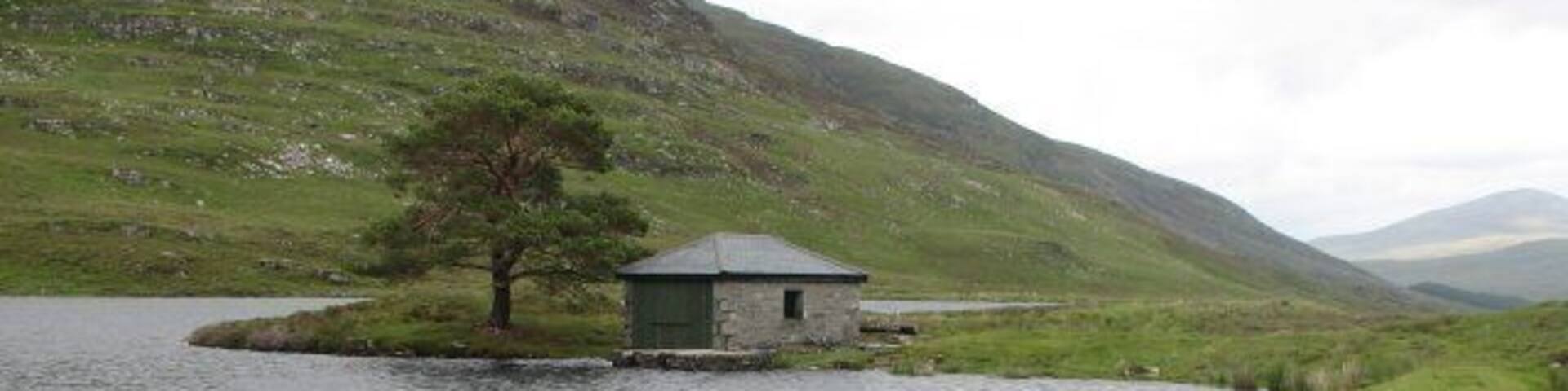 Boat house, Home Loch Lochan, enlarged by a small dam visible to the right of the photo.