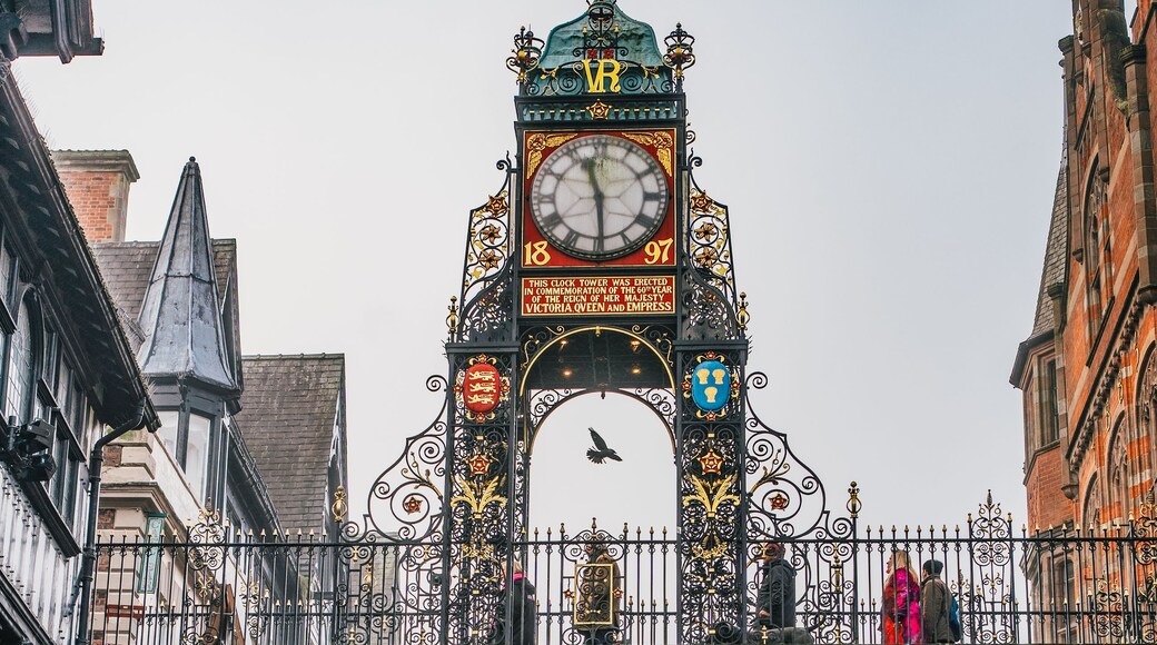 Eastgate Clock on the historic city walls above a shopping street in Chester, England
