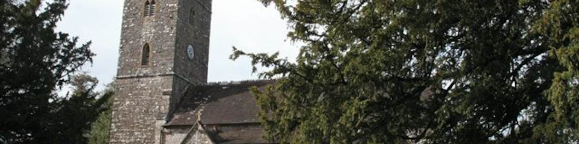 Huntsham: All Saints church Looking north-north-west. The church appears to have been thoroughly rebuilt in the 19th century. The dedication dates from 1897; the medieval patron had been forgotten by 1742